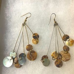 Mixed metal pierced earrings with round hanging shell discs